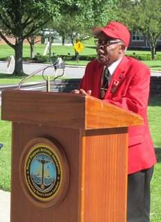 Major L. Anderson, a World War II veteran and member of the Tuskegee Airmen, speaks during a D-Day 70th anniversary ceremony, June 6, at Naval Support Activity (NSA) Annapolis. Service members and civilian personnel marked the anniversary with a six-mile road march and ceremony honoring Anderson and fellow veteran Army Maj. (Ret.) Joseph J. Ball.