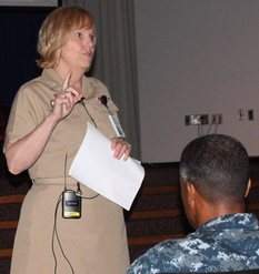 Navy Capt. Jennifer Vedral-Baron conducts her first Captain’s Call as commanding officer of the new Navy Element of Walter Reed National Military Medical Center (WRNMMC) on July 23 in Memorial Auditorium.